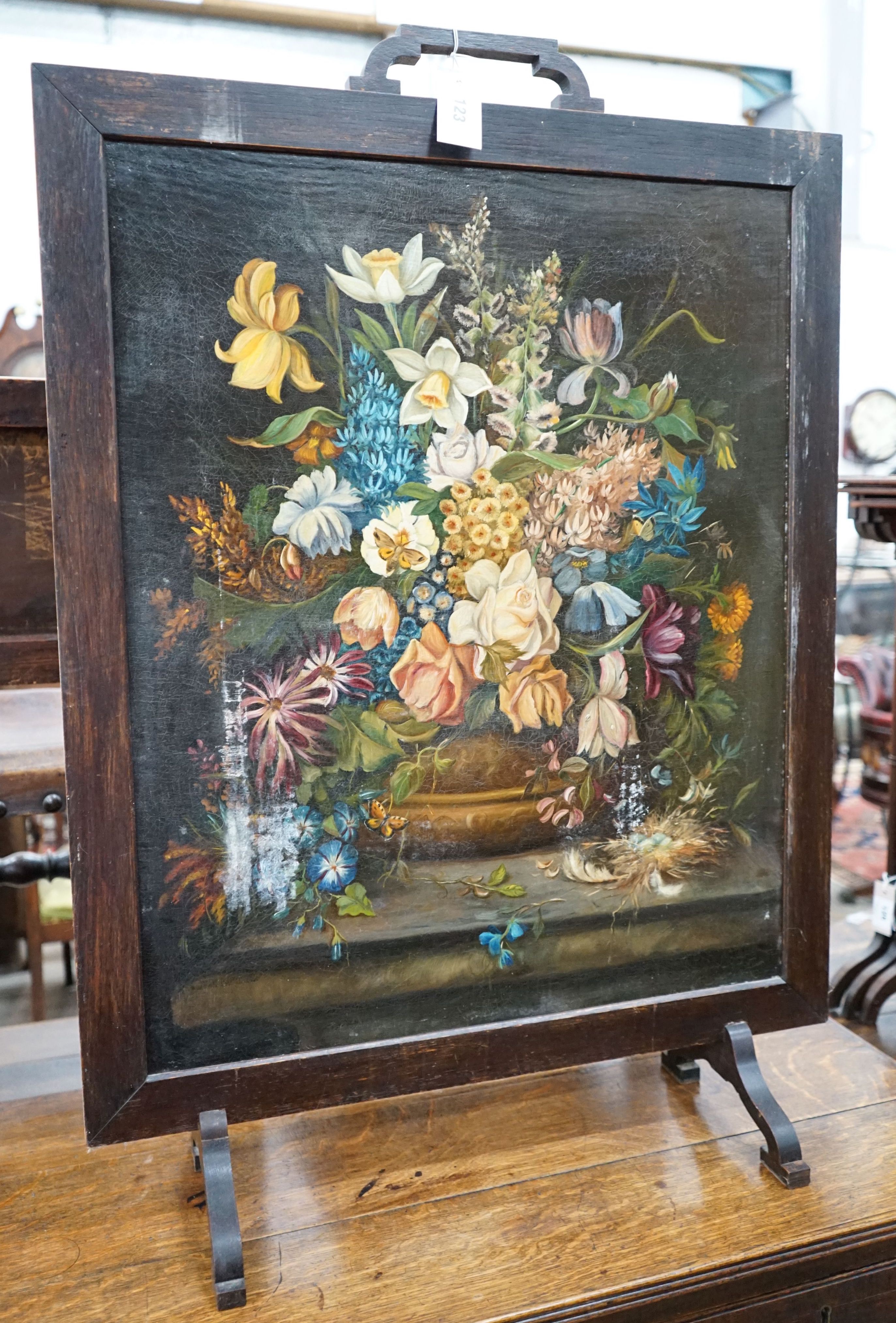 An early 20th century painted fire screen inset still life oil on canvas, width 66cm, height 94cm